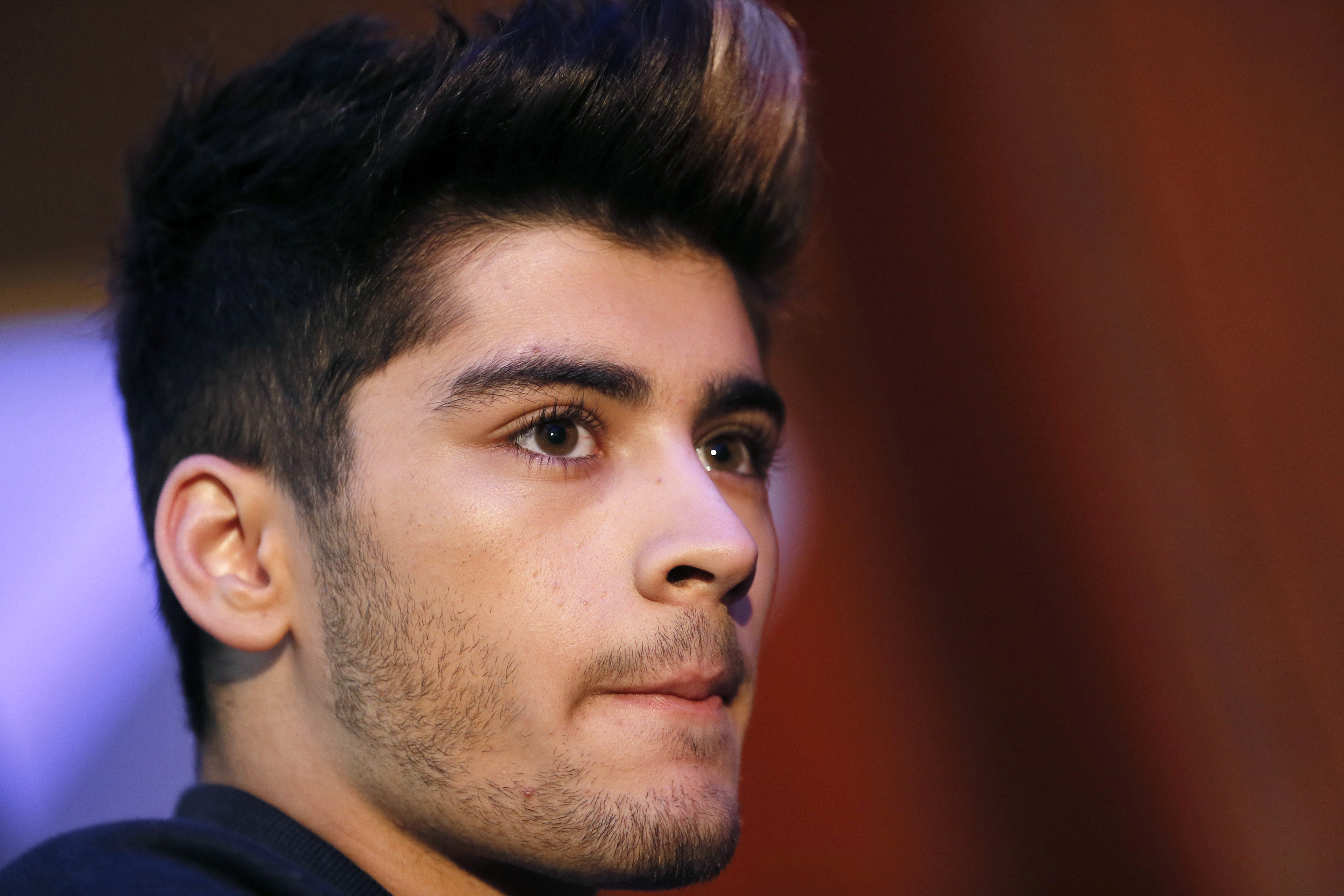 Zayn Malik Says He's 'Trying to Be a Good Example' to His Daughter Khai