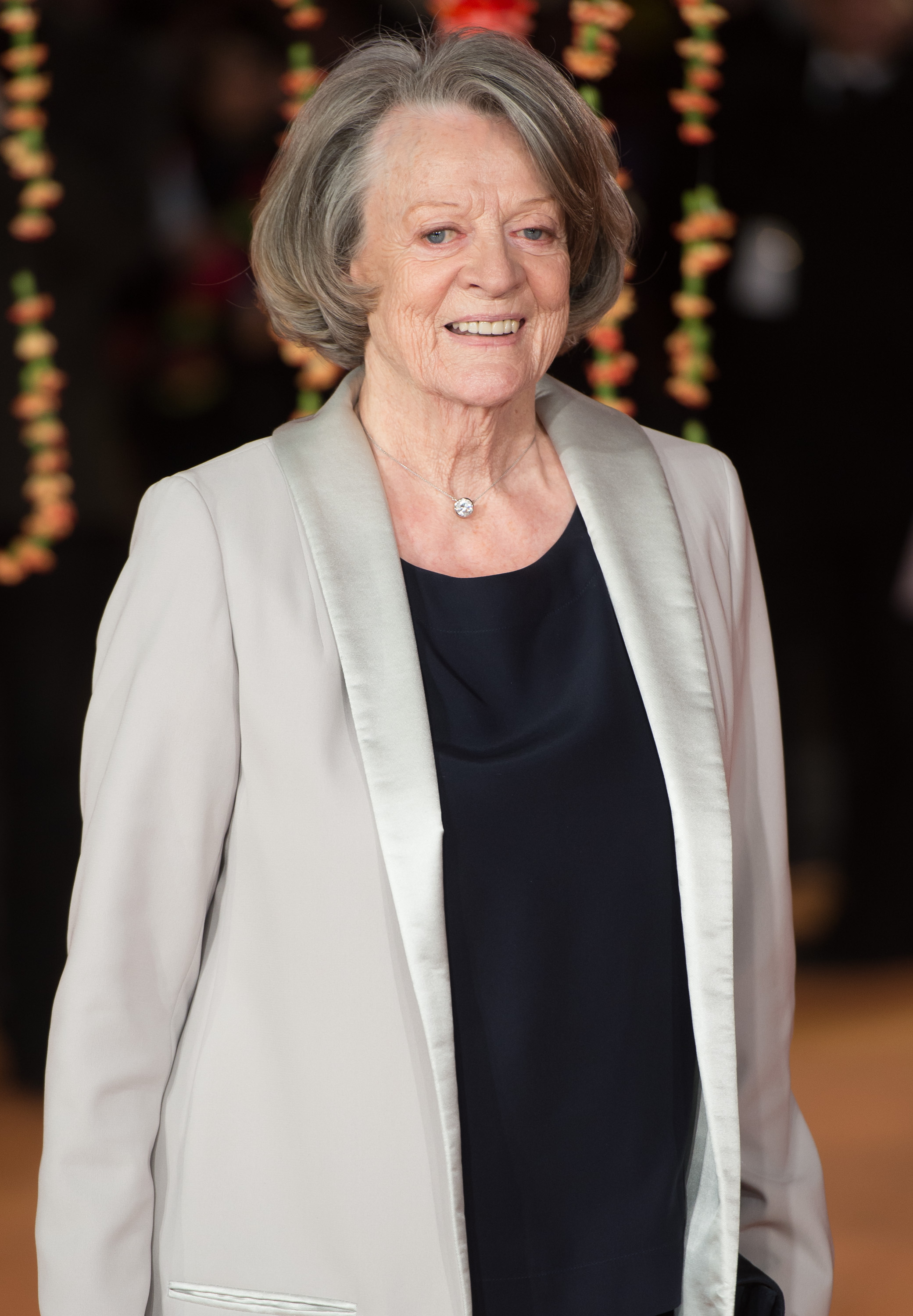 'Downton Abbey's Maggie Smith Isn't Leaving After Season 6 Contrary To