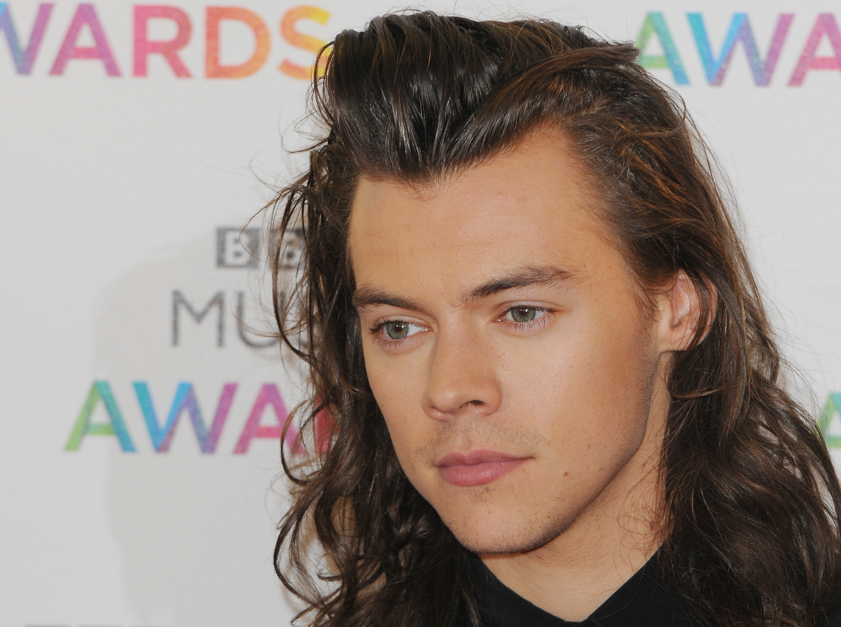 Harry Styles Shows BehindtheScenes Haircut Footage  Teen Vogue